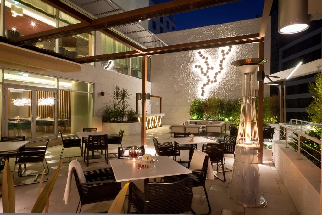 Dining area on a terrace at the Sana Lisboa hotel